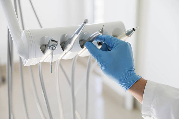 Professional Tooth Extraction technician working in Emeryville, CA
